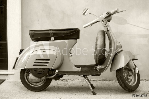 Bild på Classic Vespa scooter near the wall